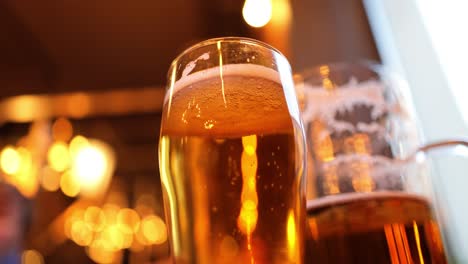 glass of light beer on a pub.