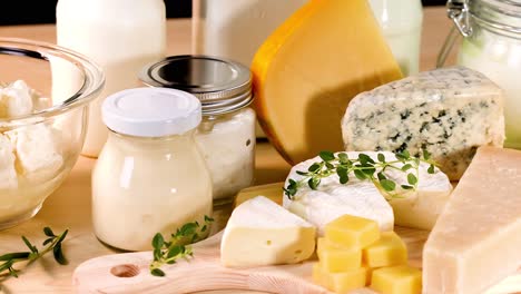 variety of dairy items on wooden board