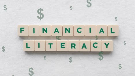 financial literacy word written on scrabble tiles, dollar signs going up at the background