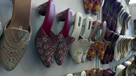 shoes in exhibition of self-help group showcase, kashmir's art, craft and decorated buildings festival art and craft of kashmir