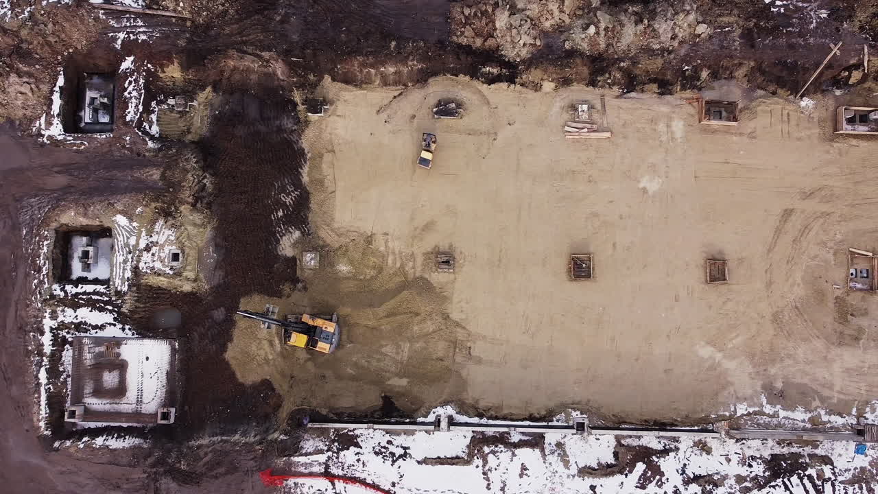 vista aérea del sitio de construcción en invierno