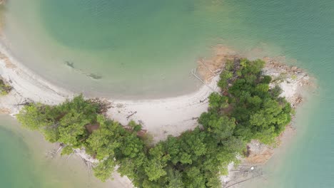 static overhead drone shot of a cove