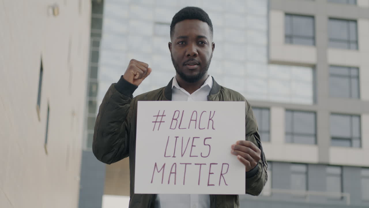 Man Holding Black Lives Matter Sign