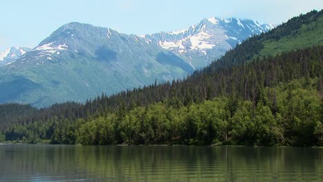 alaskan mountain and forest on a lake