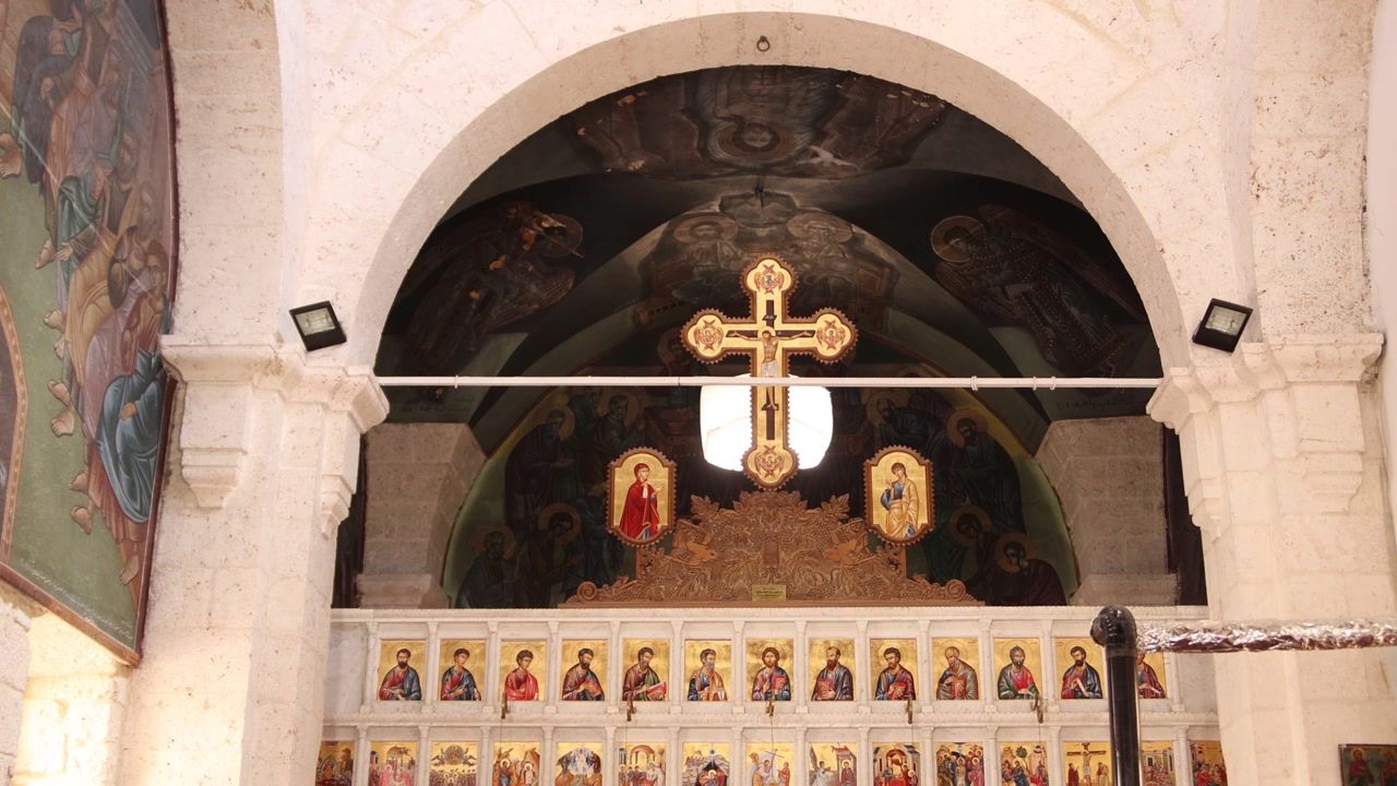 Detailed interior shot of the stone vault and sacred architecture inside the Monastery of Saint Thecla in Ma'aloula