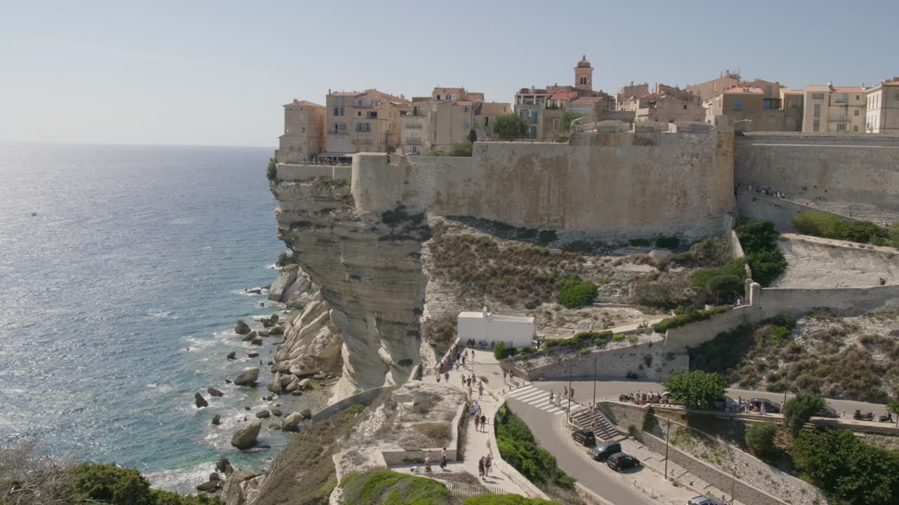 Bonifacio Corsica Cliffside Mediterranean Sea with Historic old Town and Coastal Landscape sun
