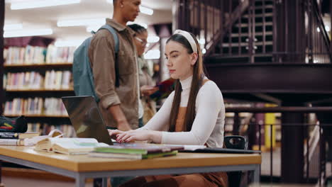 woman studying in a library