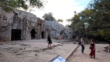 visitors explore historic site in athens, greece