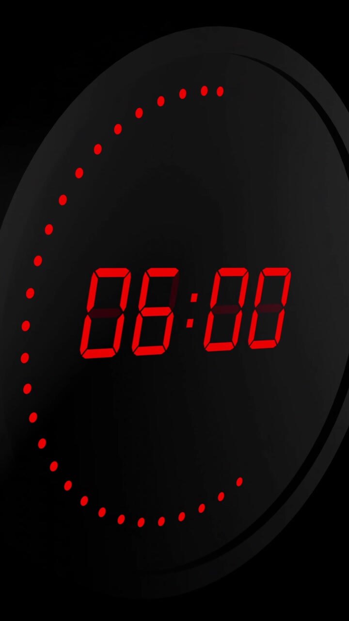 Animation of red digital timer changing on black background