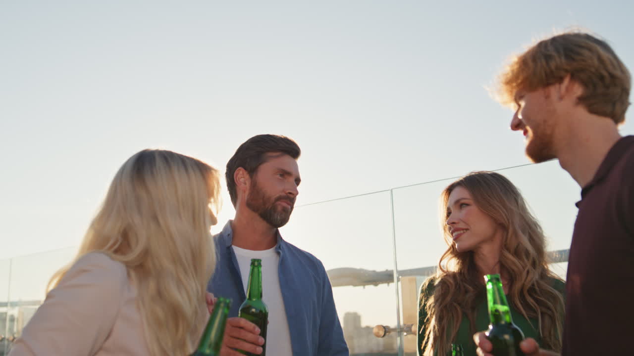 Hangout people talking friendly meeting on sunny rooftop close up. Happy friends