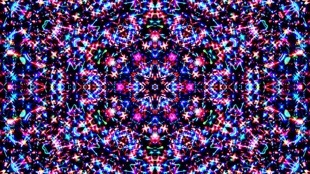 Krásný abstraktní kaleidoskop, který září, zářivé světlo, které reguluje jemné pohyby