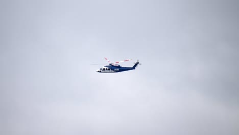 helicopter flying in real time with a cloudy sky background track