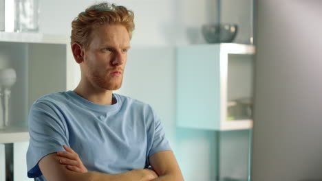 serious businessman looking computer screen closeup. tired worker find mistake