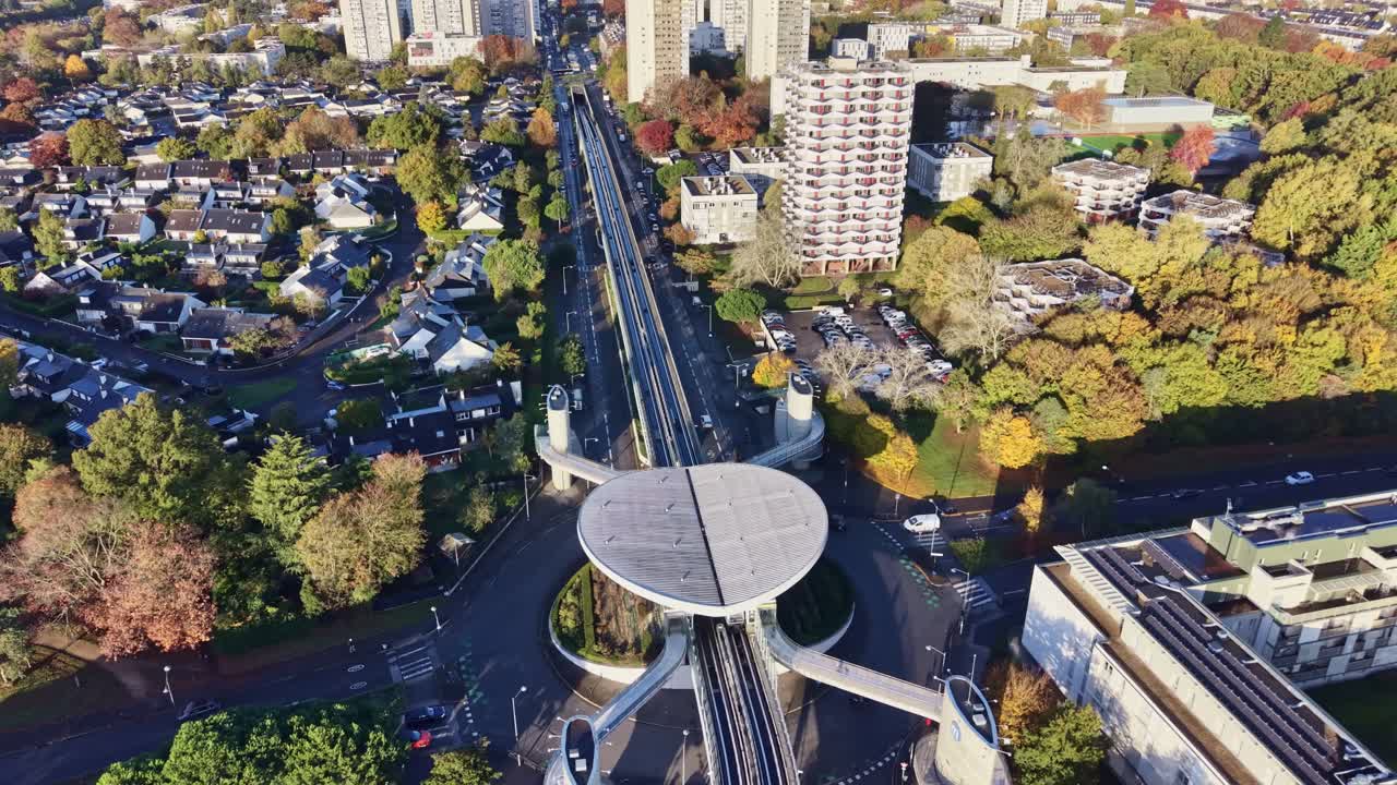 Panoramic drone fly over the 'La Poterie' metro station covered waiting point, Rennes, Brittany, France