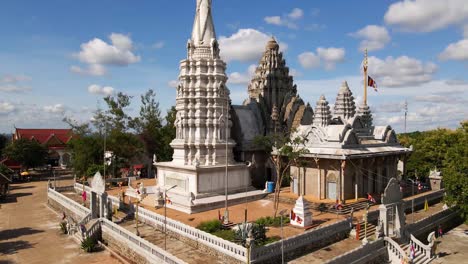 Buddhist-temple-Phnom-Pros-in-Kampong-Cham,-Cambodia-lift-shot