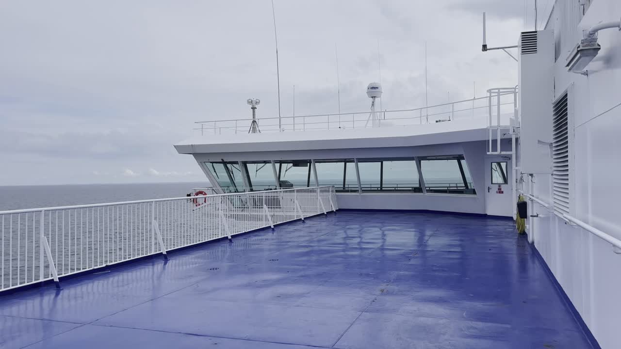 Bridge of a car ferry on the way from Germany to Sweden with no people on the ship's deck