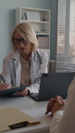 doctor consulting with patient