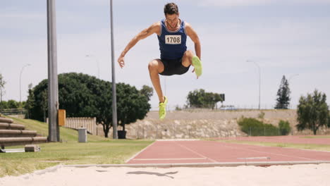 Sportsman-doing-long-jump