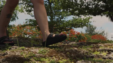 girl walking on top of big rocks, slow motion