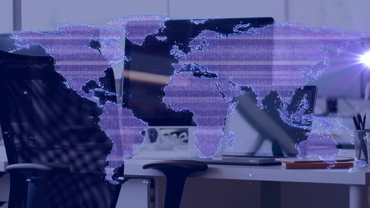Digital world map animation over modern office desk with computer
