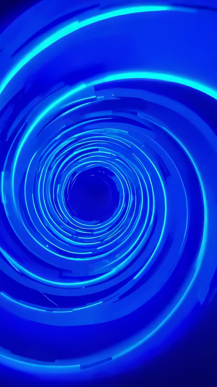 Vídeo vertical: luzes se acendendo, anéis de LED azuis girando e pulsando em direção ao centro escuro na exposição