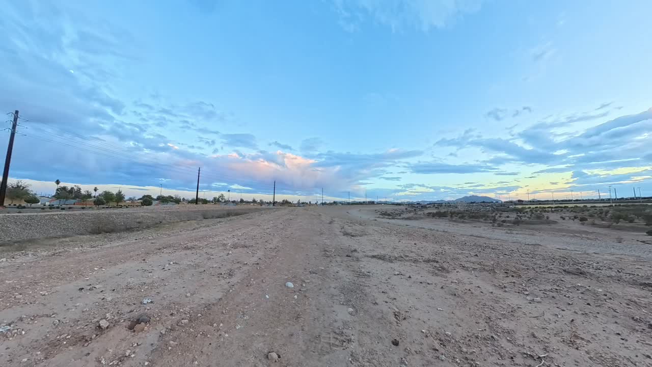 Tilting view of Storm Clouds time lapse at sunset in Gilbert Arizona.