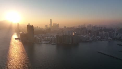 4k aerial view footage of hong kong city in sunset