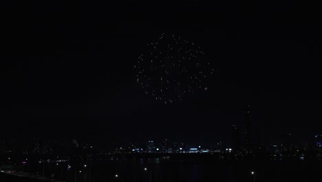 seoul night skyline during international firework festival at the yeouido han river 2024, view of 63 building, international finance centre seoul, hangangdaegyo bridge, south korea