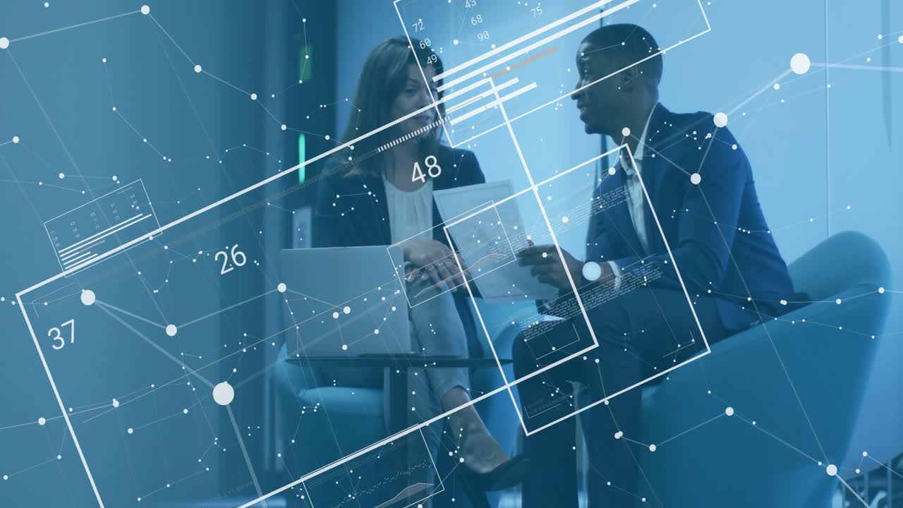 Business colleagues reviewing data in lounge, overlay cycling causing gesturing and typing figures