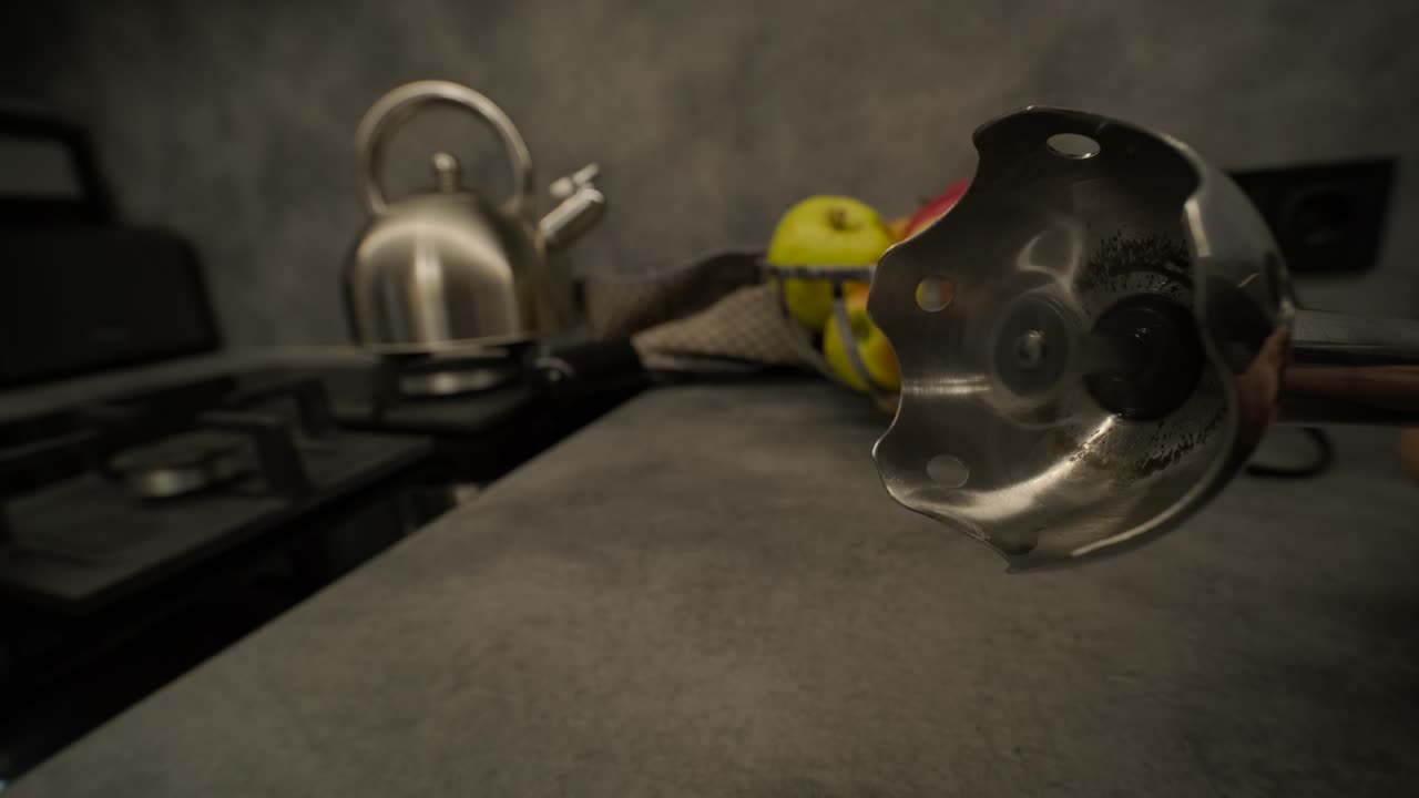 Immersion Blender Operating in a Modern Kitchen