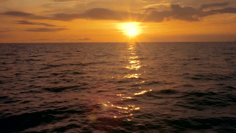 sunset on a calm and peaceful ocean.