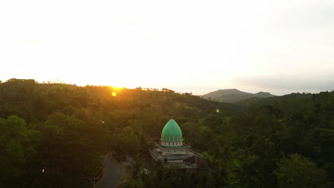 magnificent view of a mosque surrounded by greenery