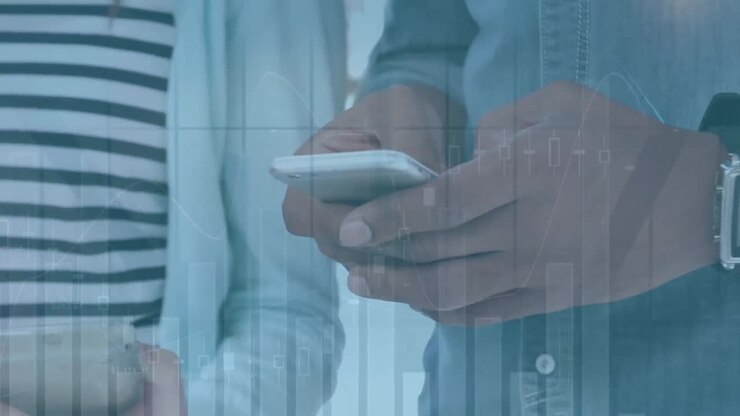 Animation of financial data processing over business people using smartphone and tablet