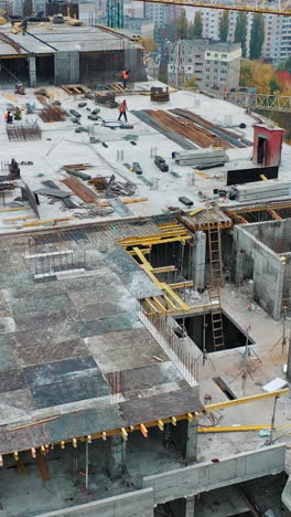 construction of a residential apartment complex. aerial view. vertical video