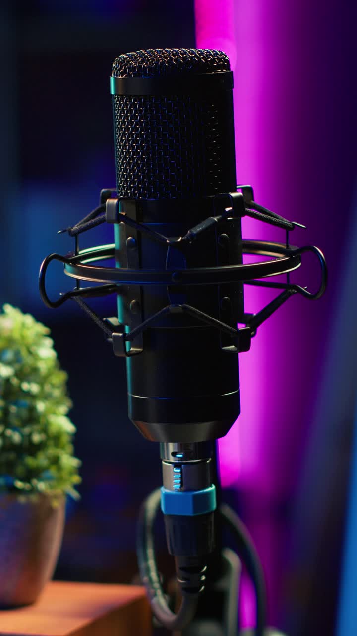 Modern Studio Microphone Setup with Colorful Neon Lighting