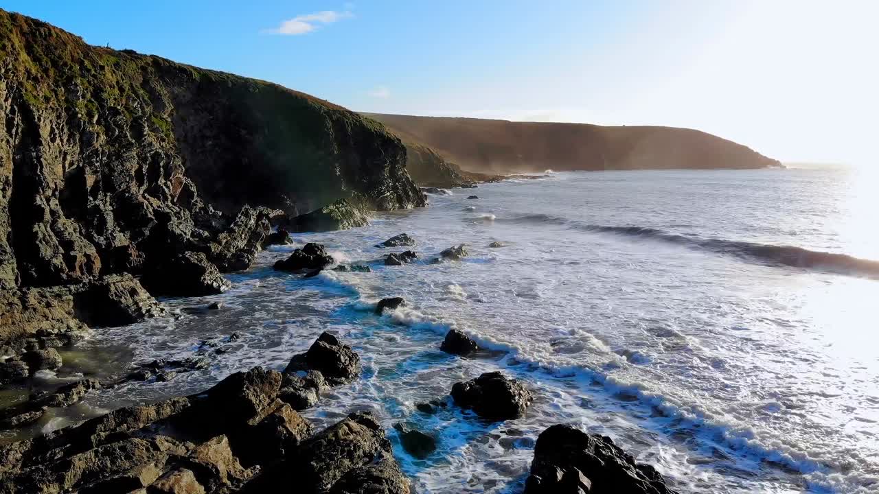 Beach with mountain cliff and sea 4k
