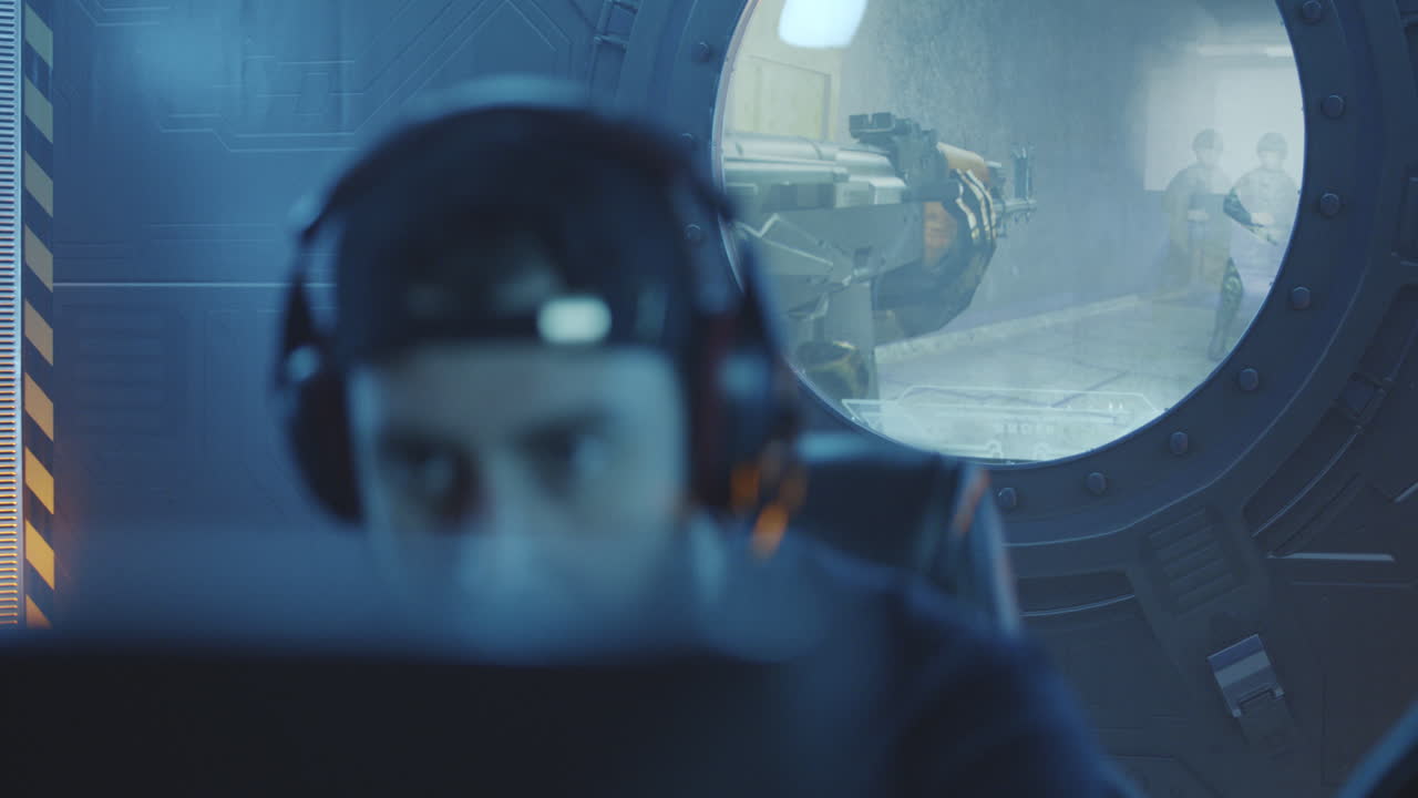 Close-up of a Concentrated Gamer Playing Video Games with Headphones