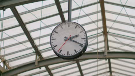 public clock on the train station in 4k