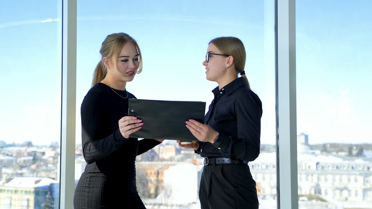 Happy business colleagues in modern office. Brainstorming at the office.