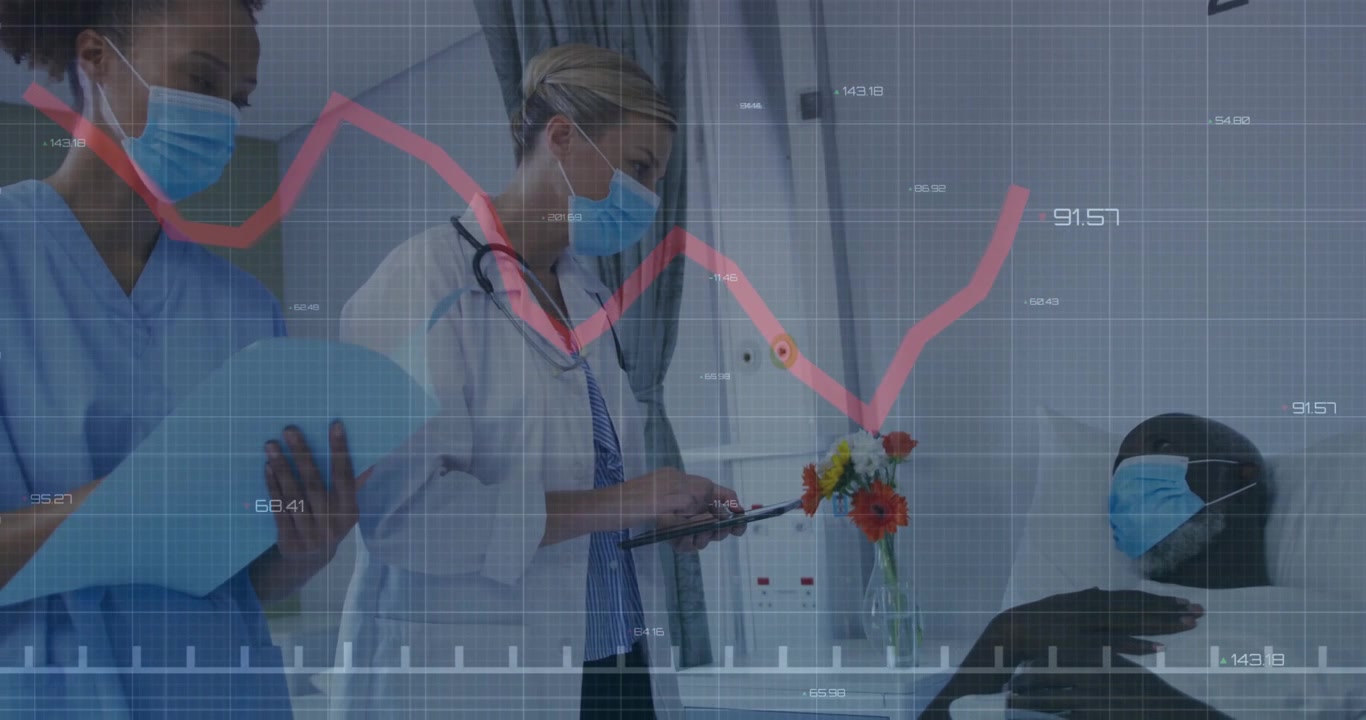Doctor haciendo una pausa en sus notas mientras un pico en el gráfico rojo incita a la enfermera a moverse hacia el paciente para monitoreo médico.