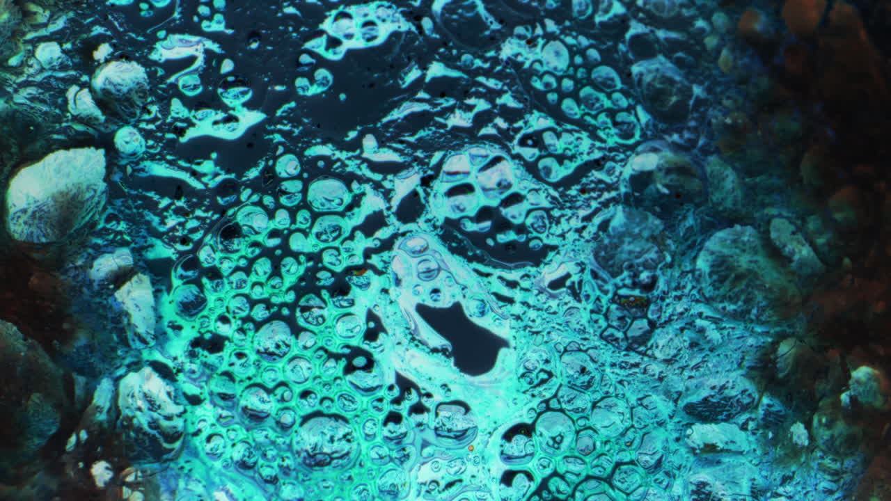 Abstract Liquid Art with Teal and Turquoise Bubbles