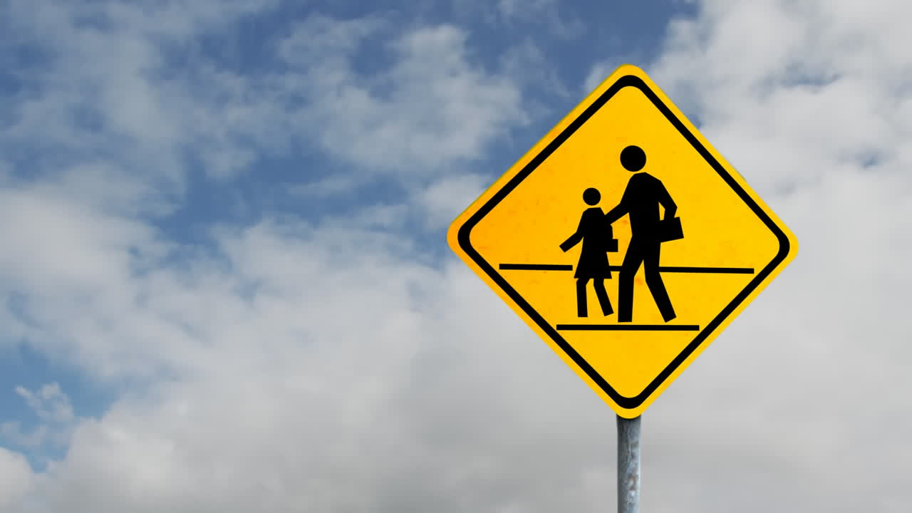 animación de una señal de tráfico amarilla con el cielo en el fondo