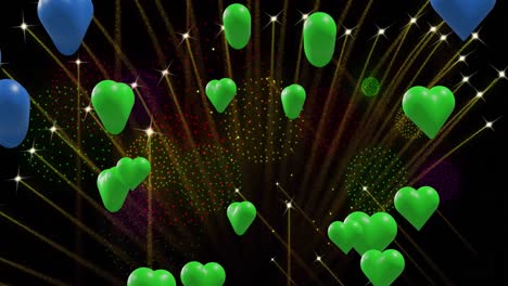 animación de corazones coloridos sobre fuegos artificiales en fondo negro.