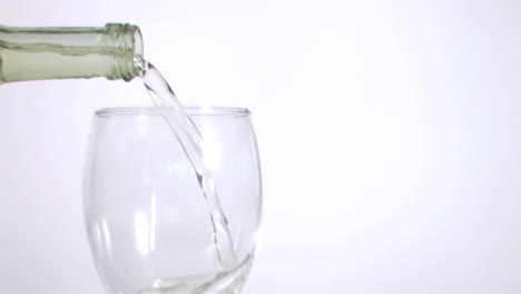 wine flowing in super slow motion from a bottle