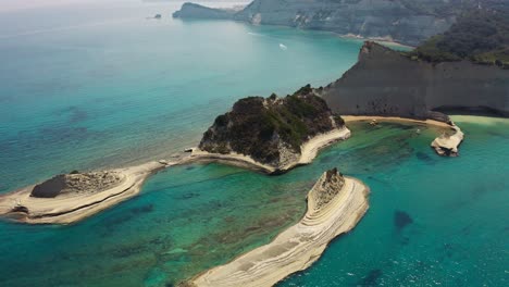 flyaway drone shot of cape drastis in corfu, greece