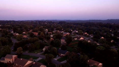 Golden-hour,-flying-over-a-typical-suburban-neighborhood-in-Knoxville,-Tennessee
