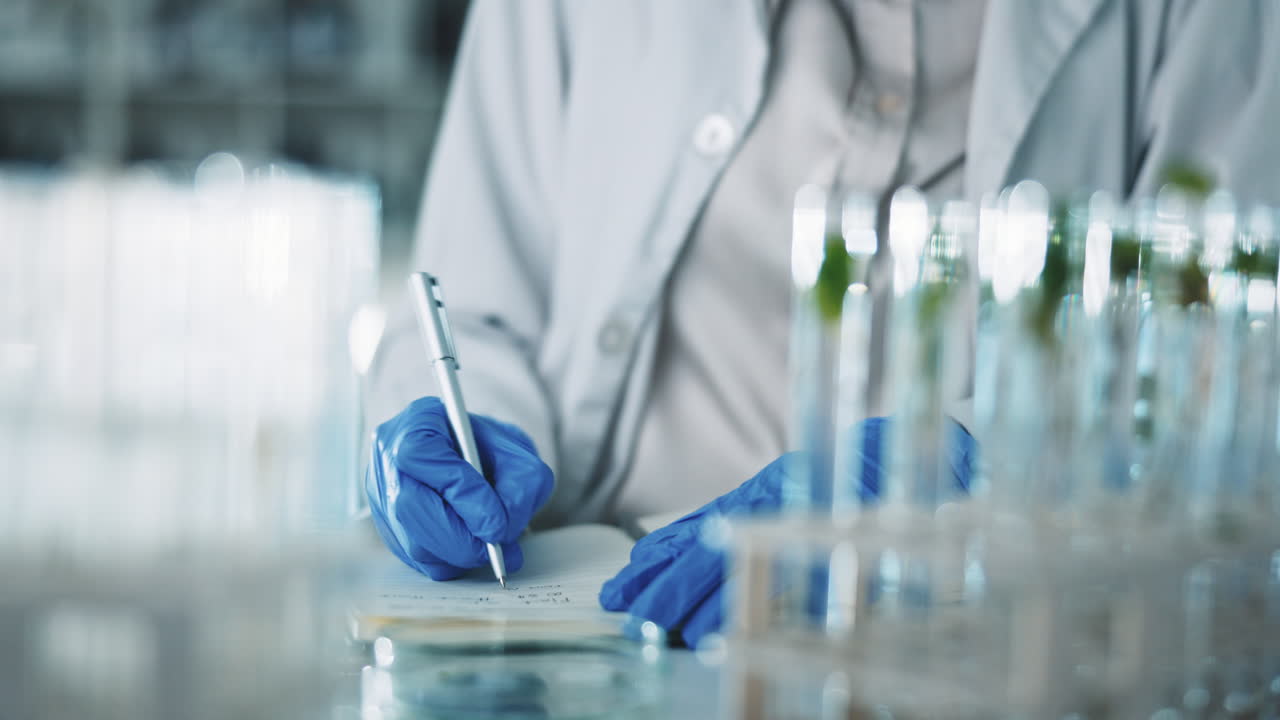 Black woman, scientist and microscope