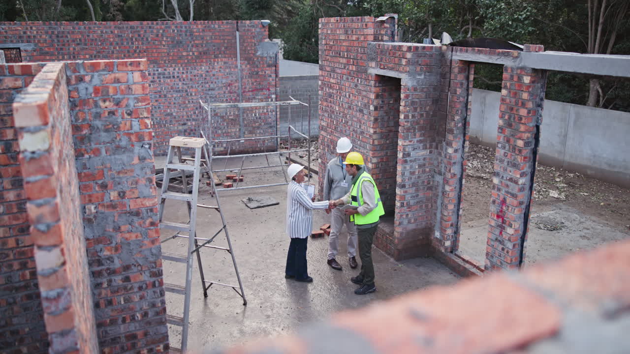 Construction site with brick walls and construction workers