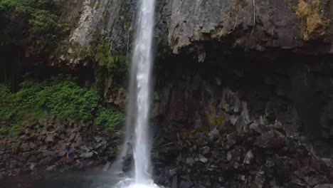 amazing waterfall pouring tons of water into rocks in xico, veracruz, mexico