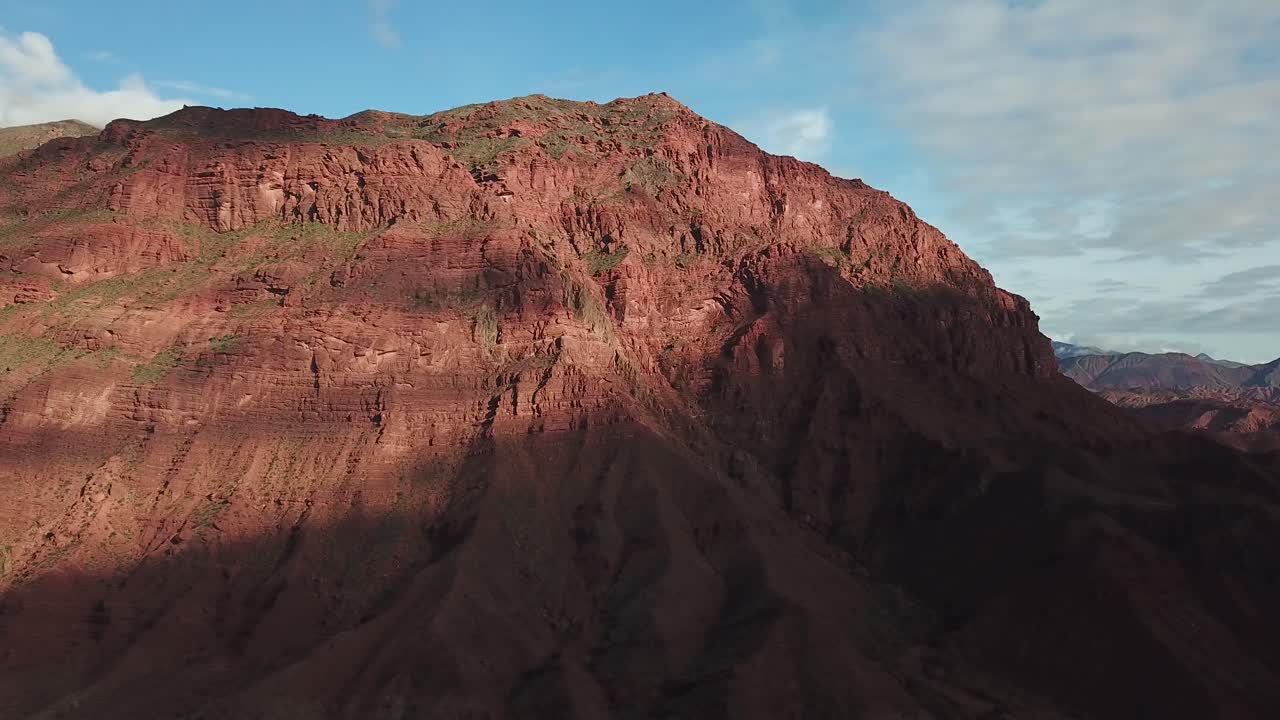 Sunrise Over Red Sandstone Hill in Calchaqui Valley, Salta Province, Argentina, Aerial View